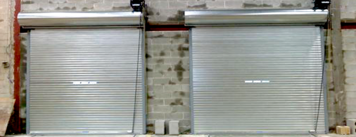 Acme Insulated Rolling Doors with Vision Lites. Motorized with Safety Edges